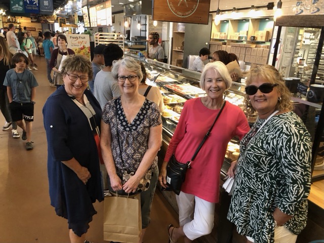 Milwaukee Food Tour guests enjoying the Milwaukee Public Market